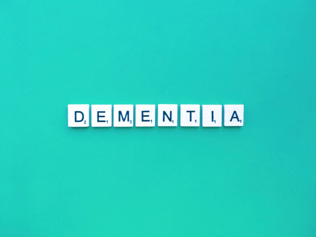 Dementia letters word on a green background