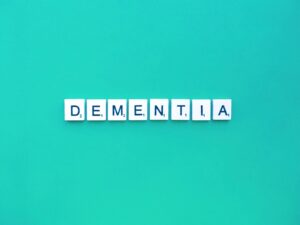 Dementia letters word on a green background