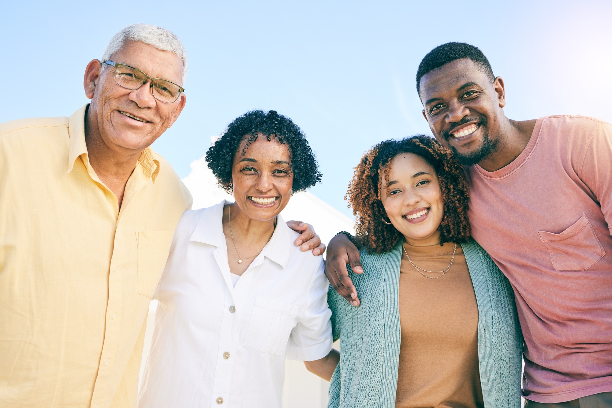 Family, generations in portrait with happiness outdoor, parents with adult children in nature, toge