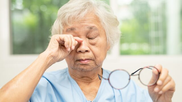 Senior woman with poor eyesight